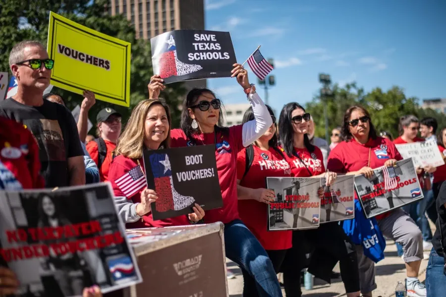 Attendees at a 2023 Boot Vouchers rally at the Texas State Capitol.